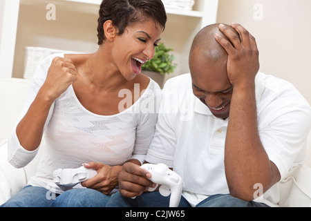 https://dttx.qbu.edu.vn/wp-content/uploads/sites/50/2023/05/african-american-couple-man-and-woman-having-fun-playing-video-console-c2jw65.jpg